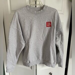 PacSun Grey Crewneck Sweatshirt with Red 'The Met' Patch